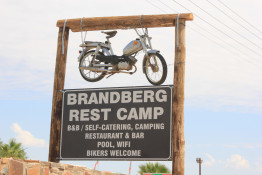 In Uis, this restaurant, motel, bar, swimming pool, and motorcycle-friendly hangout is the place to be, especially if you are a biker. (Mike Leech of Swakop suggested that the Jefferson's stop by ...)

The Brandberg Rest Camp is located in the heart of Damaraland, an unspoiled rural area in Namibia.

The Brandberg is the highest mountain in Namibia, standing at 2573m above sea level. 

There is a grocery store with basic food stuff, bottle store, filling station, curio shop and Internet café in the village.