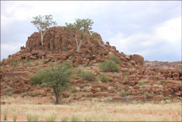 Here is a piling of Namibian red granite boulders.