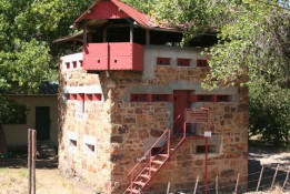 Of the more than 1,000 blockhouses built during the Anglo Boer War, few have survived, and two are located on the river south of the small town of Wolseley. They were built in 1901 by the British to protect the railway bridges from Boer attacks. The stone is local while the remaining materials were imported from Britain. Originally, the blockhouses could house 20 men with water, munitions, and supplies stored on the lower floor. The "living" area was the middle floor and was accessible by a retractable ladder and the top floor was the look-out deck. They were very effective barriers and few saw any action. Be sure to visit the Blockhouse on your next Silkbush excursion.