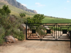 Our pretty wrought iron gate provides privacy for guests in the Kingsbury Cottage.