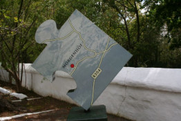 Beginning in 2007, the wineries of the Stellenbosch Wine Route, came up with the idea of showing each winery's location on these giant jigsaw puzzle pieces mounted outside each of the participating cellars. 

Morgenhof Estate is located just north of Stellenbosch and makes about 35,000 cases per year, most of which are quite spectacular. The owner, Anne Cointreau (yes, THAT Cointreau from France), is a very charming lady with whom Violetta Teetor, from Finland, and Dave Jefferson had lunch with at their first CapeWine show in 2002. Most of the key managers on her Estate are women and it appears they are all doing a bang-up job to show up a male dominated local wine fraternity. Good for them.