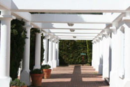 This columned walk way is just one of many indications the Morgenhof Estate Winery has been around, in one form or another, since 1692. There are a great many structures and buildings on Morgenhof Estate that we would simply refer to as "classic." (<a href="http://www.morgenhof.com">www.morgenhof.com</a>) .