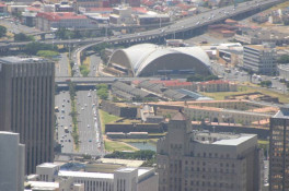 The two national freeways (N1 and N2) nicely dive into the heart of Cape Town, making for good ingress/egress, other than during rush hours. In the background, with the semicircular roofline, is the Good Hope Center, and closer toward the viewer is the old Castle of Good Hope. Cape Town is a relatively informal but modern city, relatively safe for tourists but ridden with more than its share of burglars. (Don't leave anything in your car.)