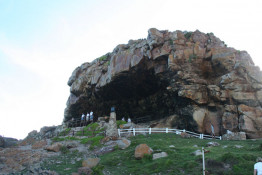 The Cape Saint Blaize Cave is a short hike up from The Point's rocky promontories. It is a major archaeological site for relics from the KhoiSan people who inhabited the natural shelter continuously for at least 80,000 years. The Cape St. Blaize Cave is situated directly under the is the site of the Cape St. Blaize Lighthouse, one of South Africa’s oldest archaeological excavations. It was first excavated in 1888 by George Leith, then by T. Rupert Jones in 1899, and by A.J.H (John) Goodwin in the 1920s. Goodwin is said to have described the Middle Stone Age Mossel Bay Industry from his findings at Cape St. Blaize . The Cave has revealed deposits dating from about 200,000 years ago to the pre-colonial period, during which time middens were laid down by herders of the San or Khoekhoen people.