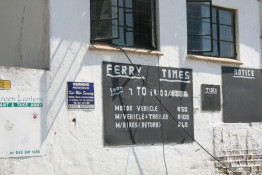 If you are at the Morgan Bay resort area and want to cross the Kei River, you must either drive back to the main highway, then a good distance north, and then via terrible roads to the coast, OR cross the river by ferry. As the sign indicates, the ferry runs during daylight hours and the cost for a passenger vehicle is R50, or about $7 (Each way.)