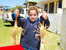 Johan, our SILKBUSH GM's son, was a damn spunky five year old, as demonstrated by holding aloft these two very live crayfish (much like lobsters). The crayfish do not have large mouths but they have very strong teeth; we were told they can easily bend a coin. We all kept our fingers away!