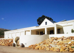 A newer winery along the Garden Route is Raka (<a href="http://www.rakawine.co.za">www.rakawine.co.za</a>) which is named after the commercial fishing boat of its owner, Piet Dryer. It is located just west of the Cape's relatively arid grain fields and a little east of Hermanus, the seaside weekend-resort town and fishing village, about two hours east of Cape Town. The winery and grounds have been designed in an absolutely first class manner, and it is now attracting a significant tasting room trade from Hermanus tourists as the brand becomes better and better known.