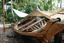 This is an artform; the boat fundis (building experts) have no written plans. The requirement for a good boat is a strong keel and a sturdy set of ribs. (Sort of what any boat needs, eh!) The keel is usually made of makuti (mangrove) as are the ribs. The side planks are mbamba-kofi (red mahogany). Important finishes include jumvi matting (made from woven palm leaves) for splash protection.